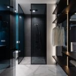 wardrobe and bathroom with glass walls in modern bedroom
