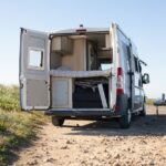 white and brown camper trailer