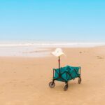 a sun hat on a beach cart