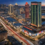 An image capturing the bustling Gulf Freeway, with its rows of vibrant storefronts and towering billboards