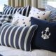 thorstenmeyer Create an image showcasing sailor inspired pillow d1e6b589 43cd 4a10 97ea 91c38783d5af IP404051 2