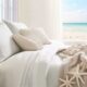 thorstenmeyer Create an image that showcases a cozy coastal bed 13610baf 1a45 4b9b a741 97ff88e2d14b IP404066