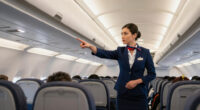 Major airline roasts passengers who jump up right after landing, igniting fierce backlash